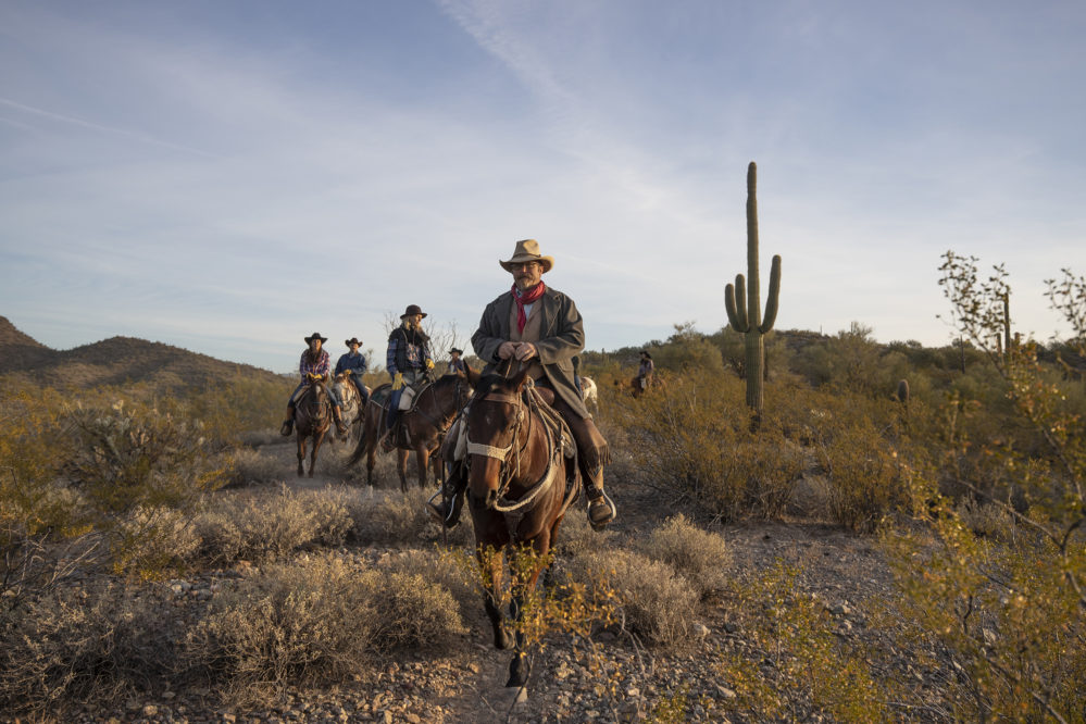 riders on a trail ride in the desert at Kay El Bar Guest Ranch