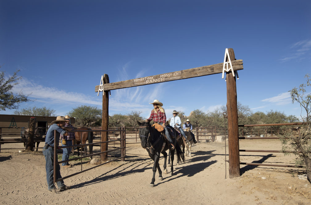 Tombstone Monument Ranch & Cattle Company riders entering gate