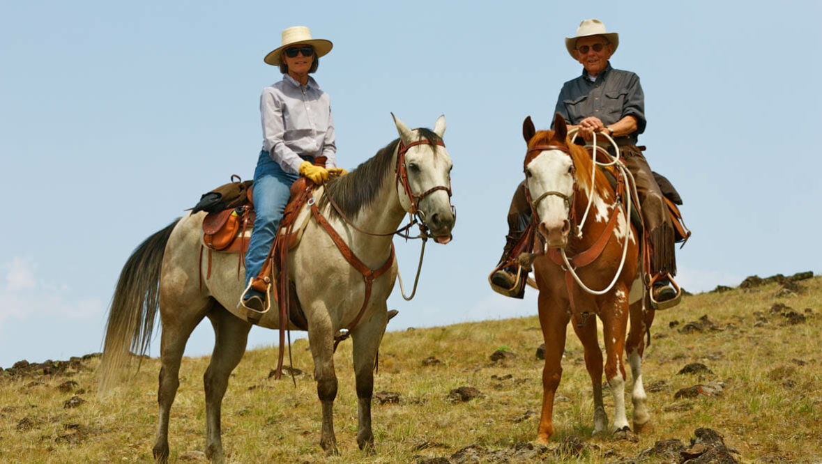 Couple on a trail ride at 7D Ranch