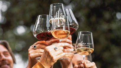 Group of people raising their wine glasses at Alisal Guest Ranch