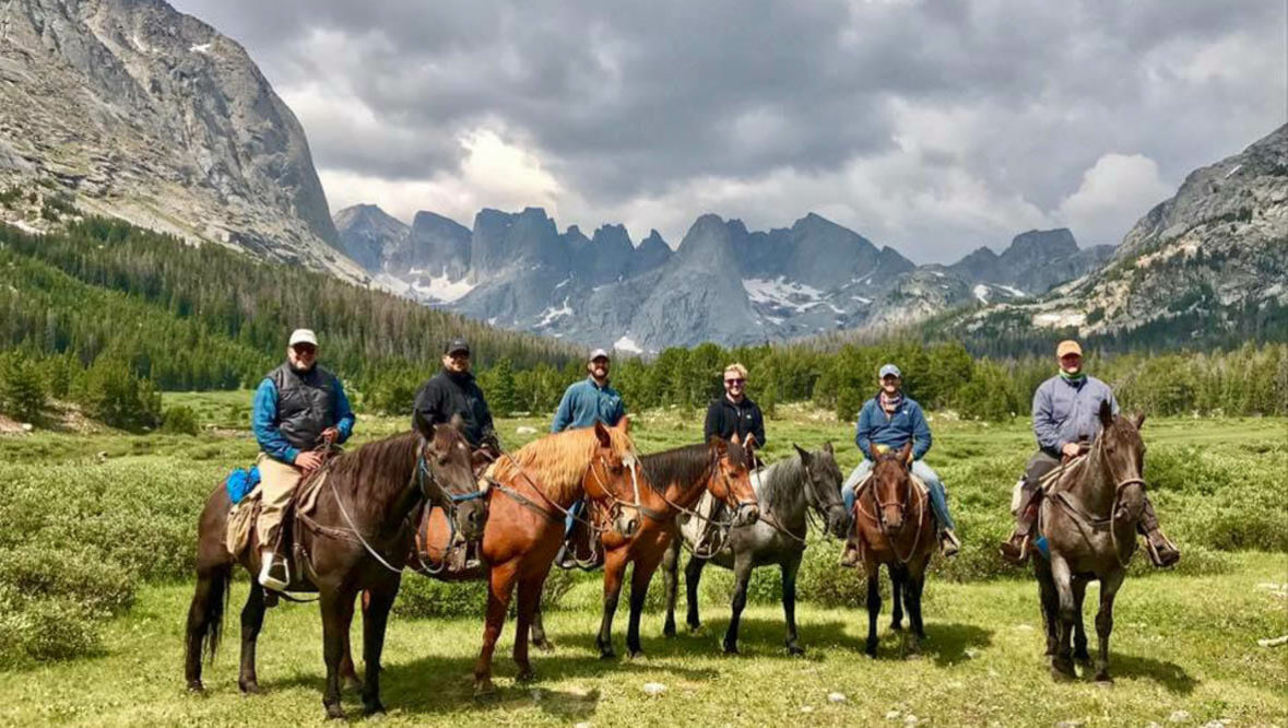 Guests on a trail ride at Allens Diamond 4 Ranch