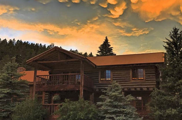 Wood cabin at sunset