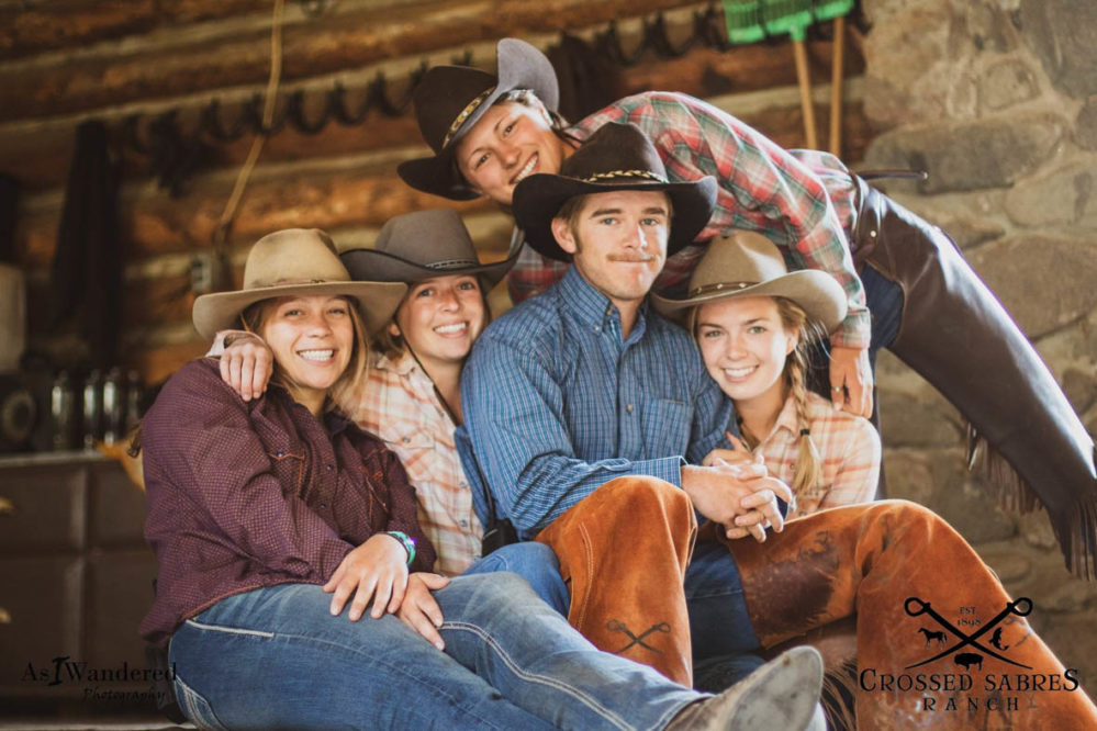 Group photo of wranglers at Crossed Sabres Ranch