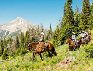 Family trail ride at Lone Mountain Ranch