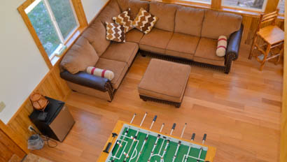 Lodge living room with foosball table at Majestic Dude Ranch