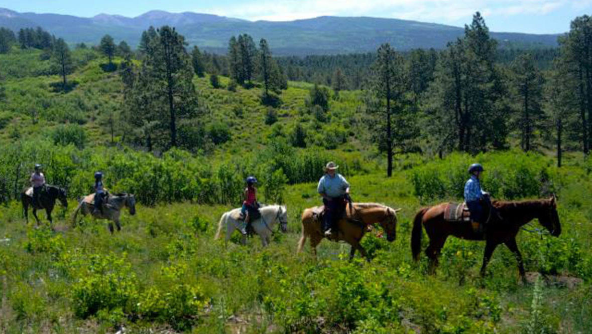 Family trail ride at Majestic Dude Ranch