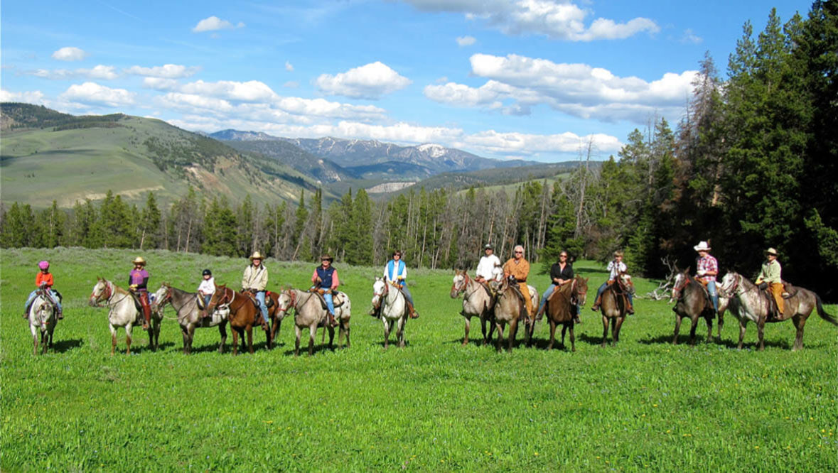 Family trail ride at Nine Quarter Circle Ranch