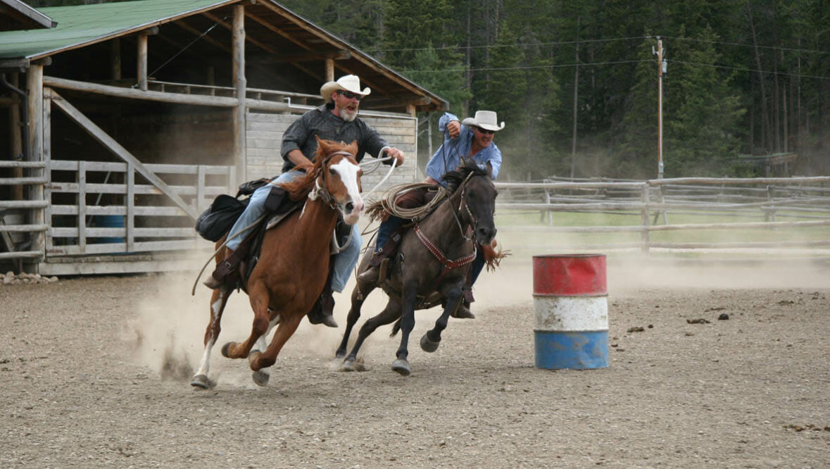 Two riders in a rodeo race at Paradise Guest Ranch