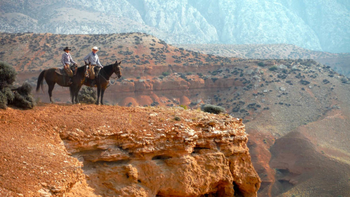 Riders on horses at Hideout Lodge Ranch