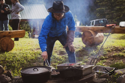 cowboy cooking over the fire