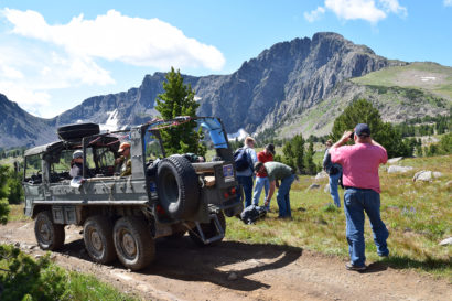 people unpacking a jeep for a camping trip Hawley Mountain Guest Ranch