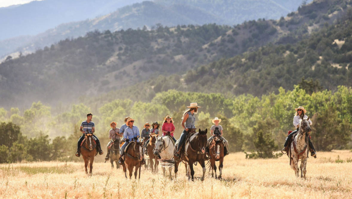 Family trail ride at Mountain Sky Guest Ranch