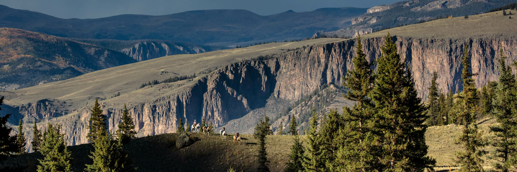 Trail ride with mountain scenery