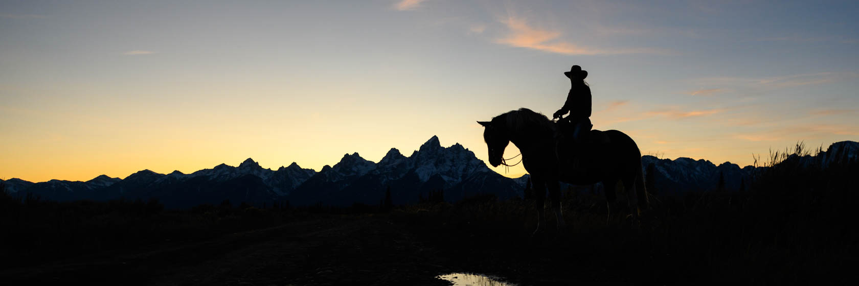 Rider in silhouette in Wyoming