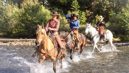 3 riders crossing Shoshone Lodge river