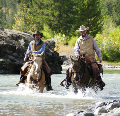 shoshone lodge and guest ranch cowboys crossing river