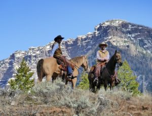shoshone lodge and guest ranch cowboys on horses