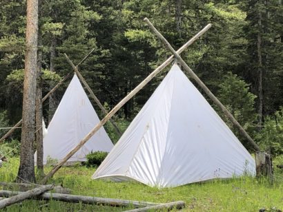 Two wall tents in camp