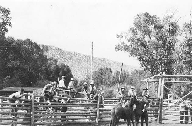Historical photo of guests on horses