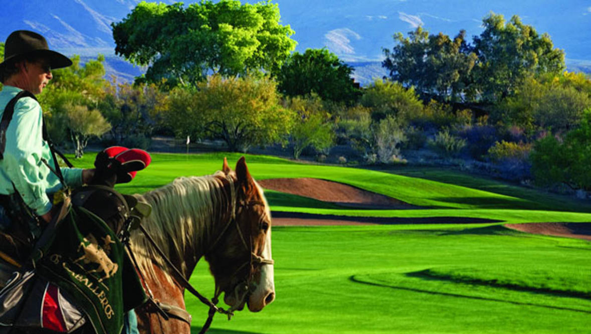 Man on horse on golf course at Rancho de los Caballeros