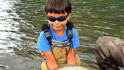 Kid fishing at Lone Mountain