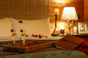 Rawah ranch champagne in cabin honeymoon