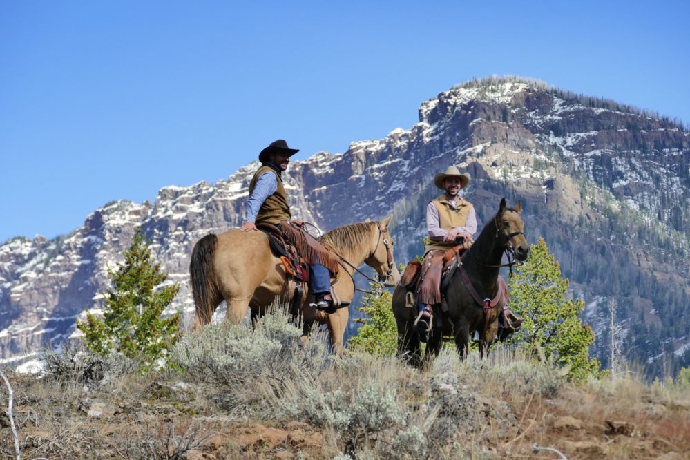 shoshone lodge and guest ranch cowboys on horses
